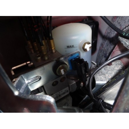 Crossfire Convertible Top Hydraulic Pump Unit 542638AA as installed in the trunk's left rear corner 